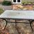 64 x 38 Glass top patio table 1 thumbnail