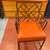 Metal Arm Chair w/Orange Cushion 1 thumbnail