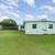 This 3-bed, 2-bath home sits on a 0.23-acre lot. 2 thumbnail