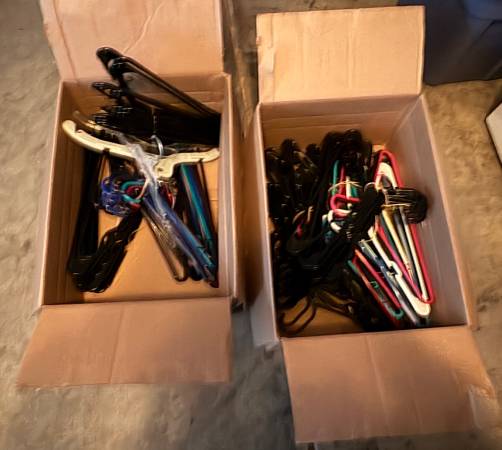 Lots of free plastic hangers. Mostly black Please take all. Bunched 1