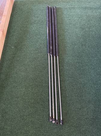 4, 40 inch, 30 lb, gas assist struts for a Fleet Four Wheel Camper 1