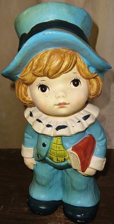 Pilgrim boy dressed in blue with book 1