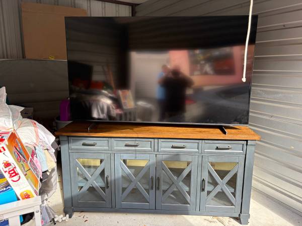 Samsung 75” smart TV with sound bar and woofer. 1