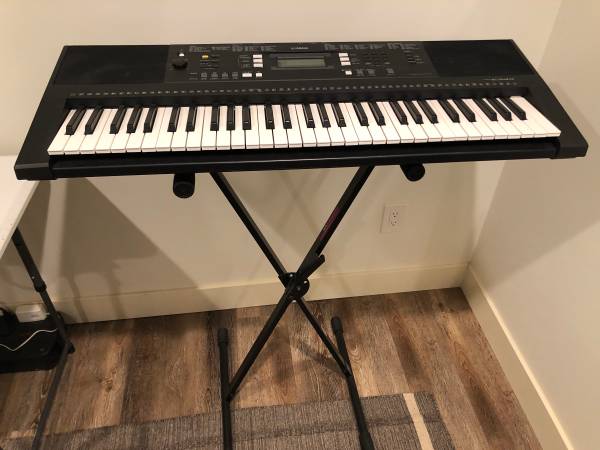 Yamaha 61-key electronic keyboard with stand and chair 1