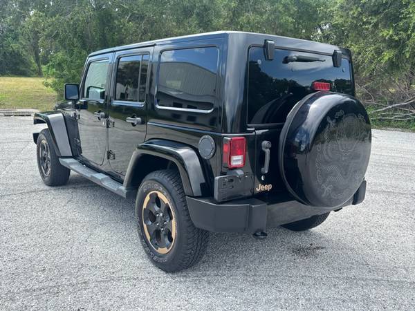 2014 Jeep Wrangler Unlimited Sahara Dragon Edition 4WD - $13,250 (Clearwater, Florida)63443422435587123