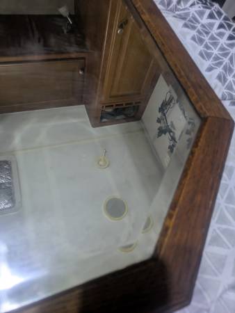 Very old antique, beveled mirror. Wooden back. 1