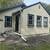 2 Bedroom, with sun porch and a nice fenced in back yard with a 2 car 1 thumbnail