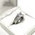 Brand new princess cut CZ diamonds in a sterling silver wedding ring. Size 5. 2 thumbnail