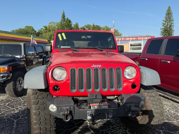 2011 Jeep Wrangler Unlimited - $13,499 (Holiday)63443316081793124