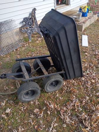 Utility wagon that lifts to empty easy 1