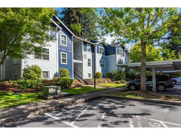 Wooded setting, Spacious 2 bedroom, W/D, Carport, Large Balcony 1