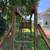 Outdoor Wooden Play set with slide, two swings, trapeze bar, and climb 5 thumbnail