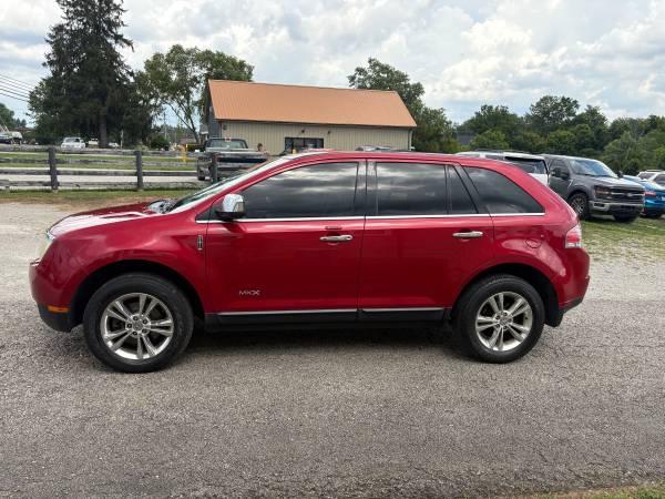 2010 Lincoln MKX AWD-asientos de cuero calefaccionados y refrigerados-Sistema Microsoft SYNC-Techo solar - $7,00063654695881603121