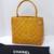 Gorgeous Vintage CHANEL Medallion Tote handbag in Enamel Yellow Gold H 10 thumbnail
