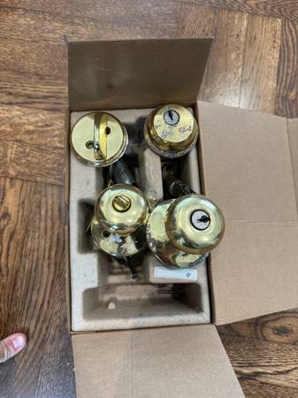 Brass doorknob and deadbolt 1