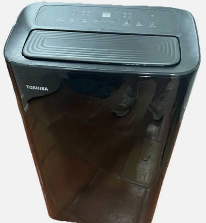 Almost new blk Toshiba portable air conditioner 1