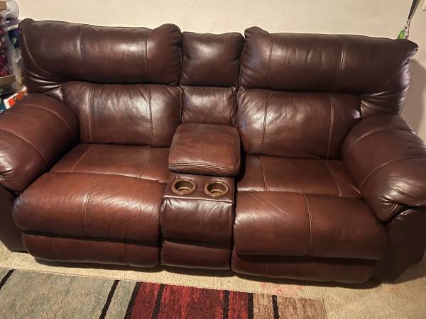 Leather sofa and loveseat all recliners 1