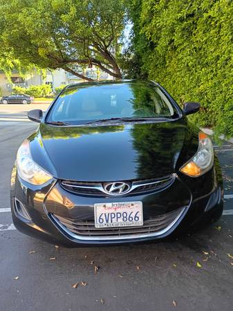 Hyundai Elantra GLS 4puertas sedán 2011 (1.8L 4cil 6A)
Kilometraje: 82300 - $6,300 (Northridge)63624607833219120