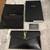 SAINT LAURENT Smooth Shiny Calfskin Monogram Uptown Clutch Black 1 thumbnail