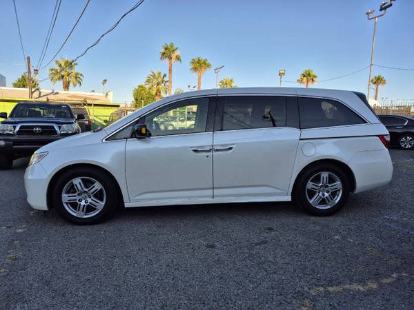 2013 Honda Odyssey Touring - $13,912 (Sacramento)63619230569347124