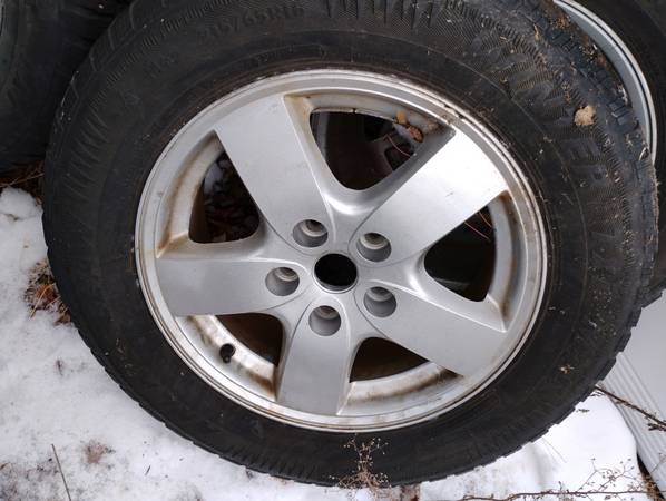 4 Chrysler Product Rims16" with 4 Studded Snow Tires 1
