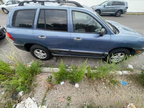 2003 Hyundai Santa Fe - $1,80063477047169155123