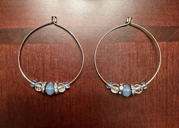 Pretty light blue earrings on a silver tone hoop 1