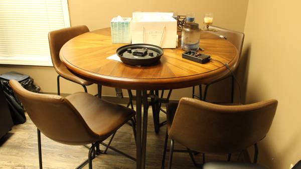Like new Ashley Dining table wood/metal w/labels & 4 Chairs 1