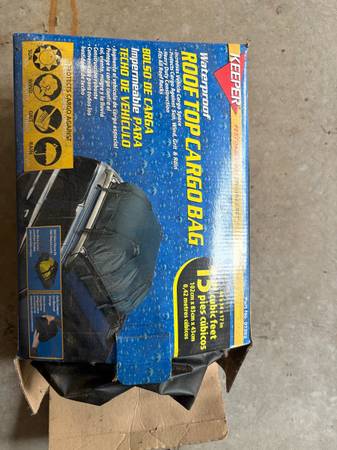 Vehicle roof carrier 1