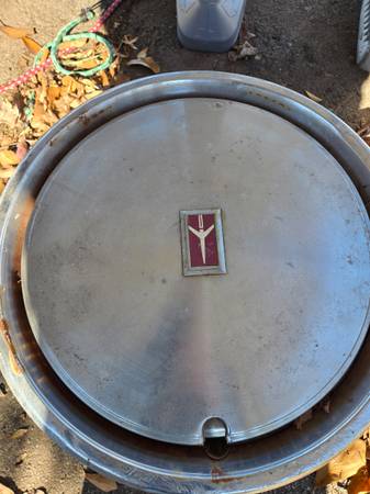 Vintage Oldsmobile hubcaps 1