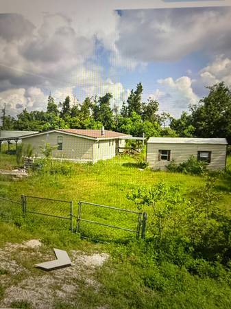 $140,000 / 3br - 1800ft2 - Large House with long covered porch and metal roof. Large double Lot!! (Panama City)63924679645955124