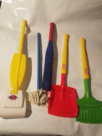 Kid shovel rake vac uum mop and baseball bat 1
