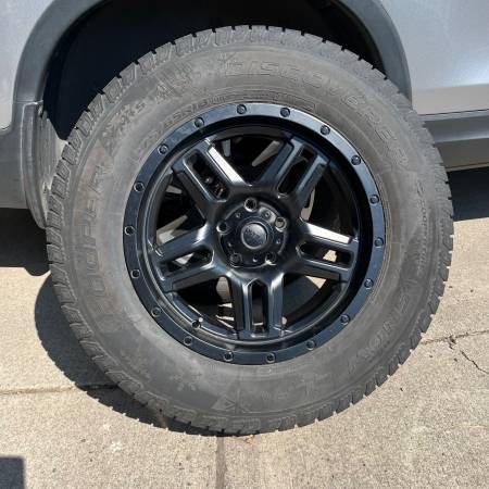 Jeep Wrangler - 4 STUDDED TIRES mounted on WHEELS 1