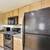 Gourmet Kitchen with Black Whirlpool Appliances || 2+2 in Prime Encino 10 thumbnail
