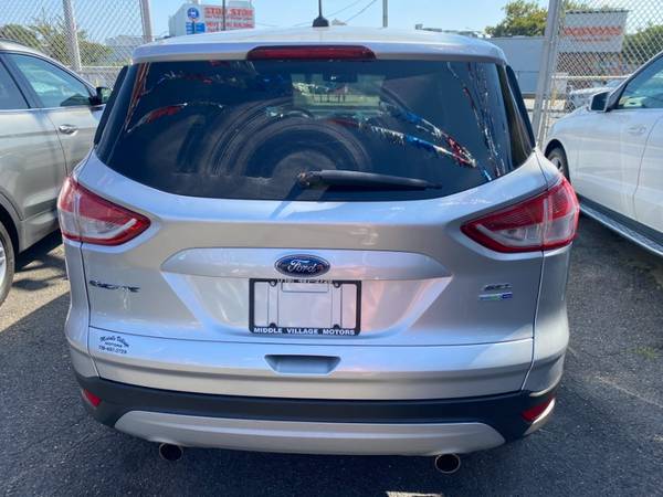 An Impressive 2013 Ford Escape with 102,554 Miles-queens - $7,995 (Middle Village)63618038991873124