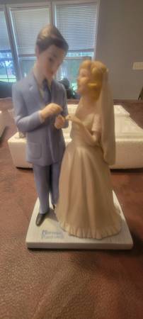 3 statues, norman rockwell "with this kiss", "memories", and David Gee 1