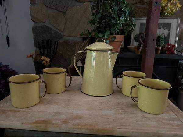 Antique yellow enamel, coffee pot and 4 cups. $75 for all. 1