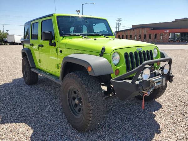 2013 Jeep Wrangler Unlimited Sport 4x4 4puertas - $14,995 (Cheyenne)63442874578819123