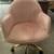 Pink upholstered office chair on wheels 1 thumbnail