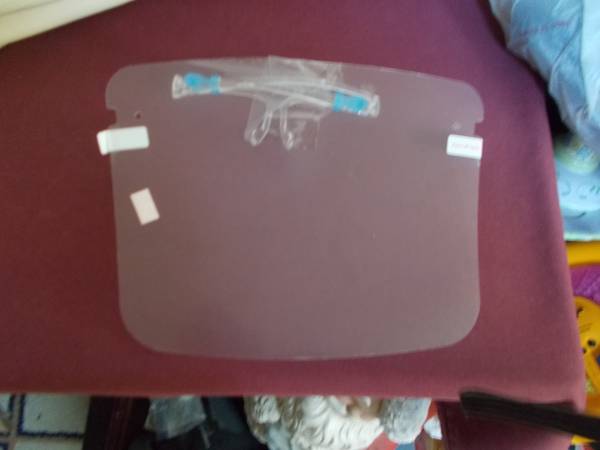 A plastic face shielded w/ others 1