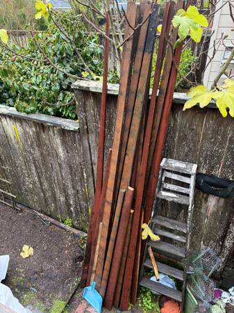 About 15 10ft pressure treated boards (angled cut) 1