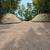 Excavation: Lot Clearing, Rock Retaining Walls, Driveway Construction 6 thumbnail