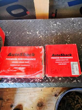 4 drilled/slotted rotors and front and rear pads ( New) 1