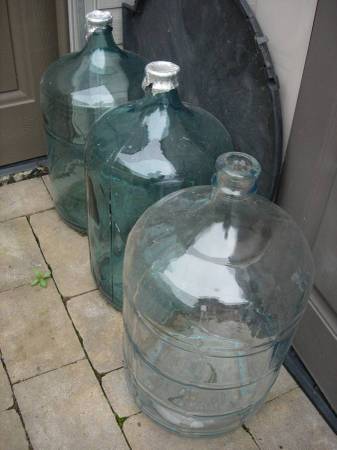 5 Gallon carboys one 6 1/2.   Corny kegs 1