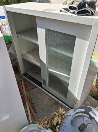 3 solid steel and glass cabinets 1