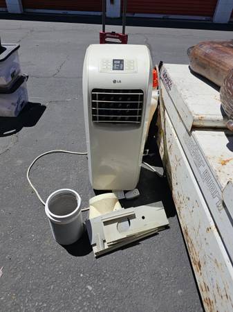 LG Portable AC Unit 7000 BTU 820w Model # R410A 1