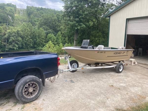 1990 Sylvan deep V 17’ with 88hp Evinrude 1