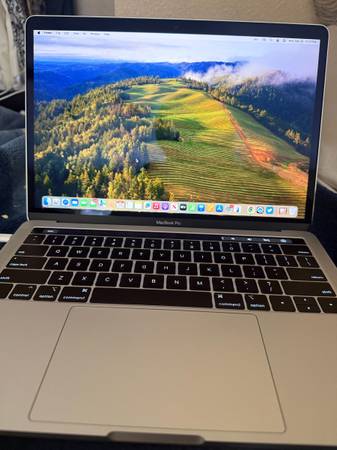 Silver 13” Macbook Pro with Touchbar 1
