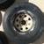 4 Ford 15x8 white spoke wheel with used 31x10.50 R15 tires 2 thumbnail