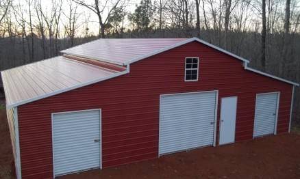 Extra Large Red Deluxe Barn With Three Garage Doors 1